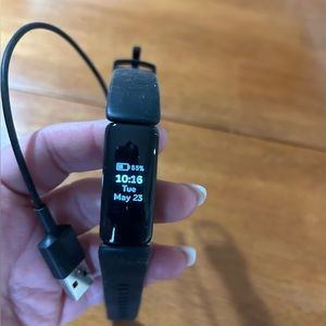 Fitbit - used a few times- with charger